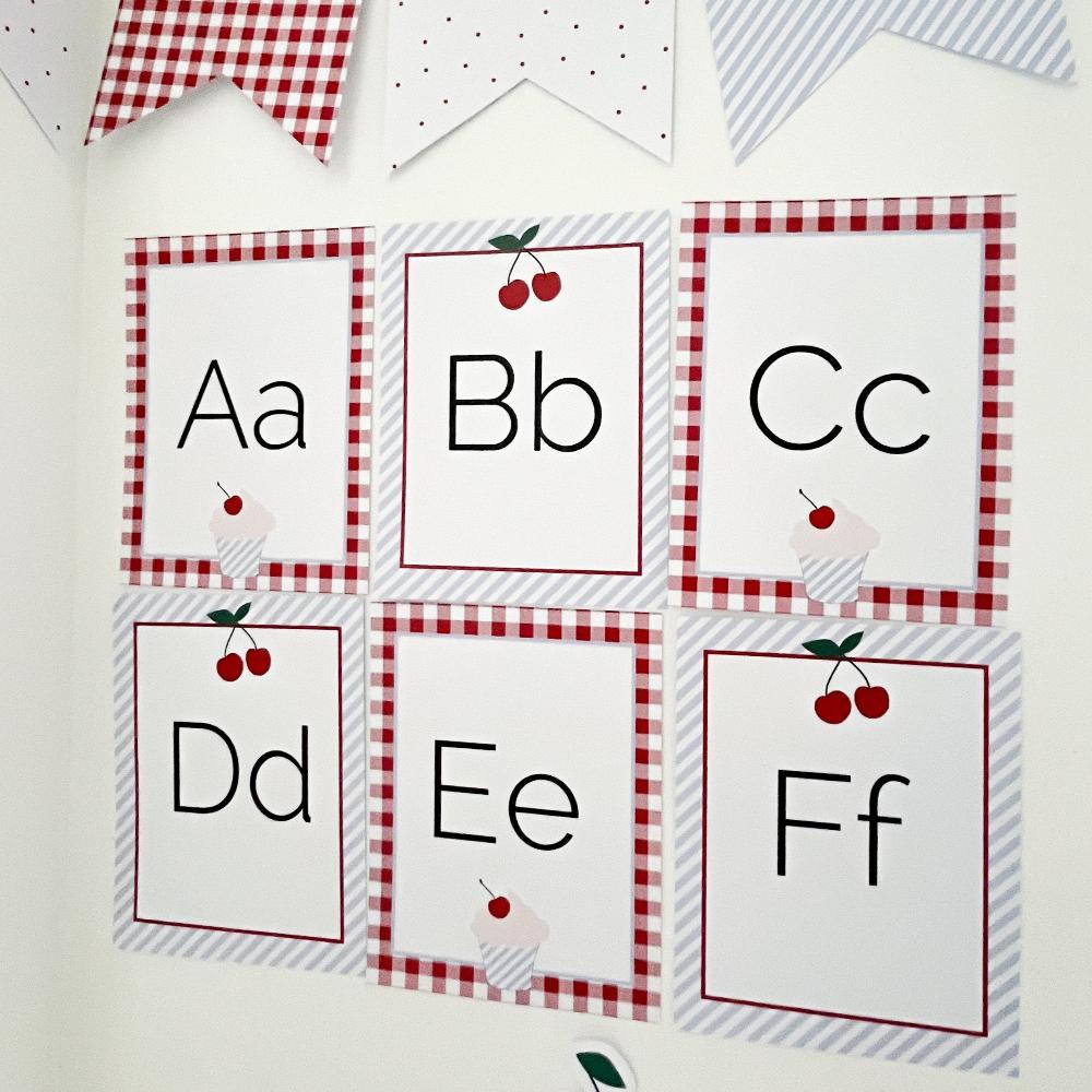 Cherry Themed Alphabet cards on a wall by The Printable Place