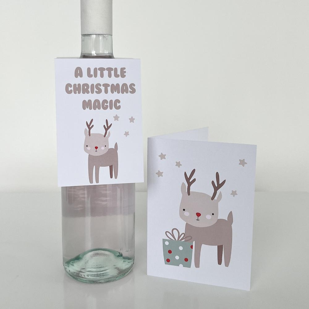 Christmas greeting card and wine label with a cute reindeer on the design