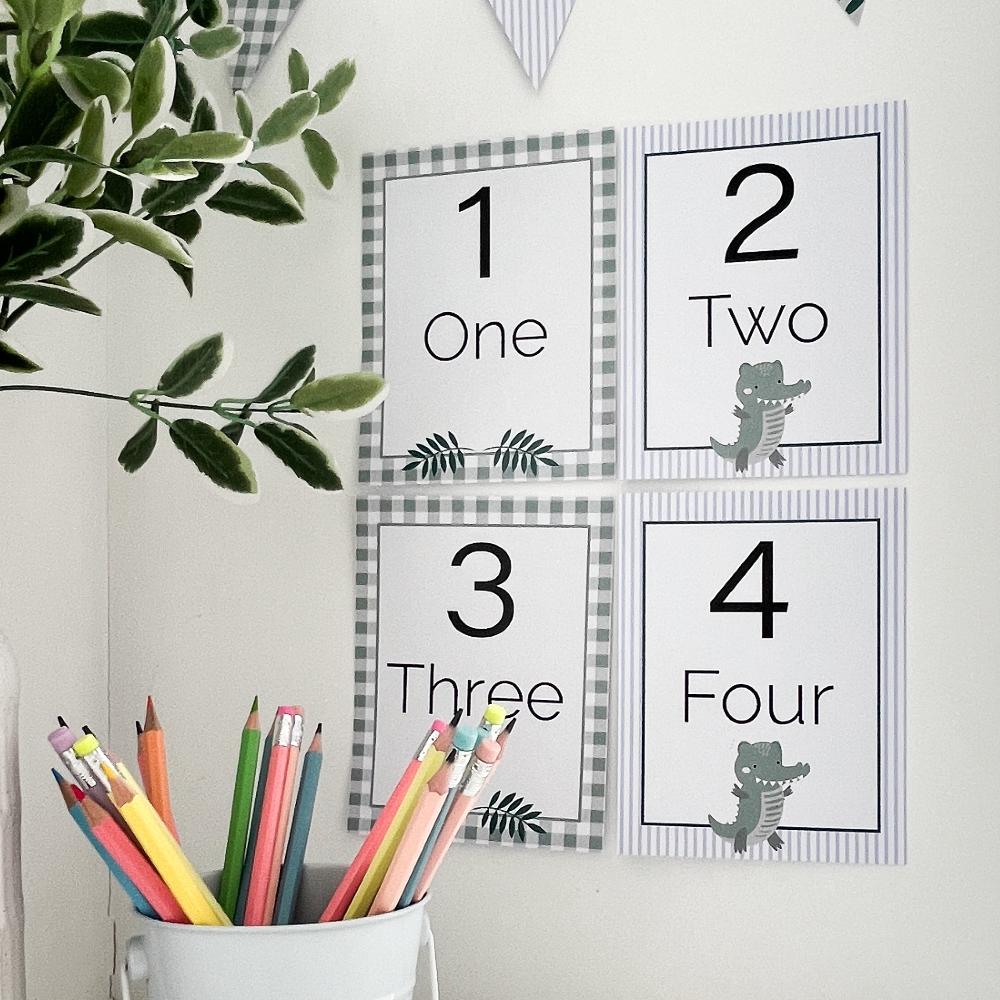 Number flash cards on bulletin board in classroom. 